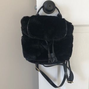 Steve Madden mini back pack.